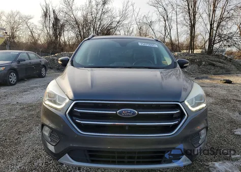 2017 Ford Escape Titanium z USA, uszkodzony, nr VIN 1FMCU9JDXHUE33011